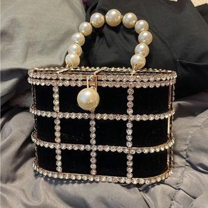 Chic black purse with beautiful diamonds